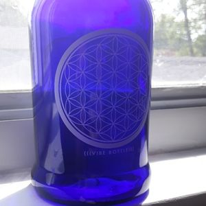 Flower of life glass bottle